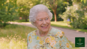 Queen Elizabeth II portrait with the Queen's Green Canopy Logo