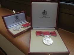 A British Empire Medal in its box