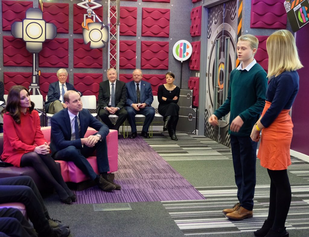 Prince William and Princess Catherine backstage at Dock 10 Studios at the BBC listening to a presentation
