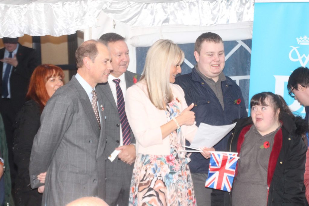 Prince Edward, The Earl of Wessex being escorted around The Hamlet in Wigan during a D of E Visit