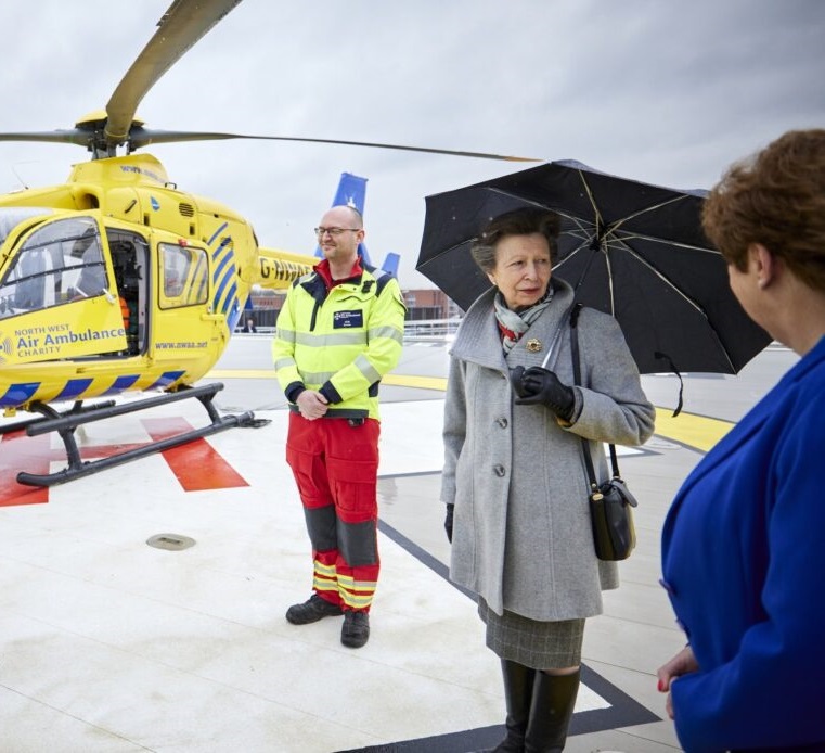 Princess Anne stood on the helipad at the Manchester Royal Hospital next to the Air Ambulance during the helipad's official opening