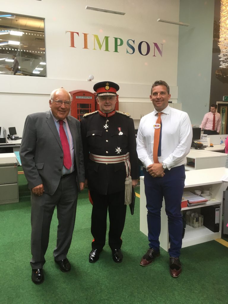 Sir Warren with Sir John and James Timpson during a visit to present their Queens award for Enterprise