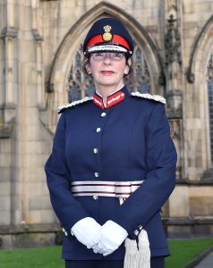 Mrs Diane Hawkins the Lord-Lieutenant in uniform outside Manchester Cathedral